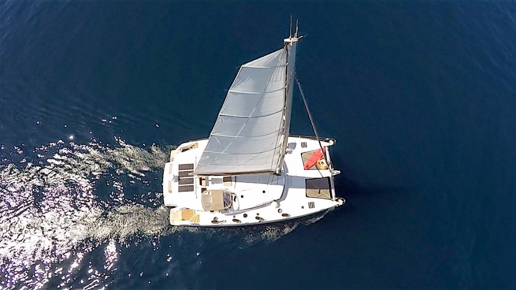 Luxury catamaran yacht HIGH JINKS cruising in Greece with Contact Yachts