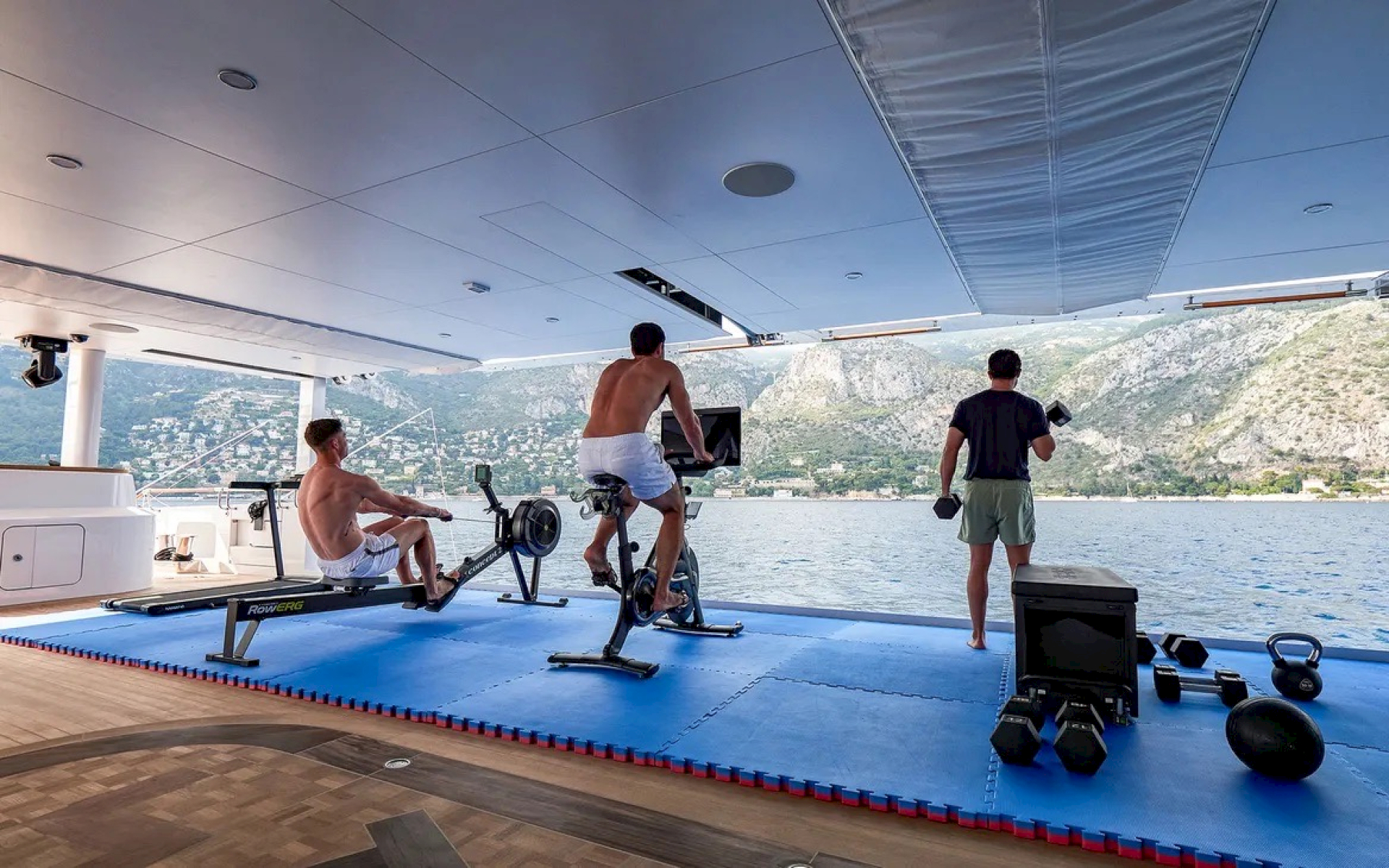 guests_work_out_on_coral_ocean_mega_yacht